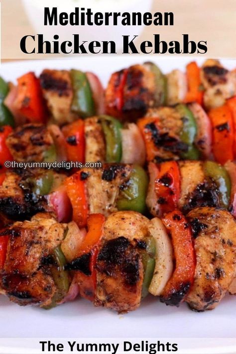 close-up of mediterranean chicken kebabs, in a skewer, placed on a plate. Chicken Kebabs In Oven, Mediterranean Chicken Kabobs, Mediterranean Chicken Skewers, Grilled Mediterranean Chicken, Kebabs Skewers, Chicken Shish Kabobs, Chicken Starter, Chicken Starter Recipes, Chicken Kebab Recipe