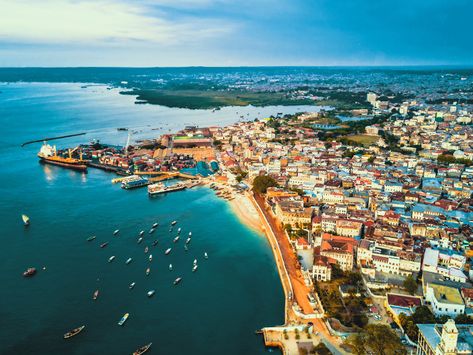 Port of Zanzibar from above, revealing Stone Town and its surroundings. #travel #Africa #Tanzania #Zanzibar #island #aerial #view #drone #image #photography #city #harbour #ocean #sea #boats Stone Town Zanzibar, Zanzibar Beach, Zanzibar Travel, Zanzibar Beaches, Zanzibar Tanzania, Tanzania Travel, Stone Town, Book Flights, Africa Do Sul