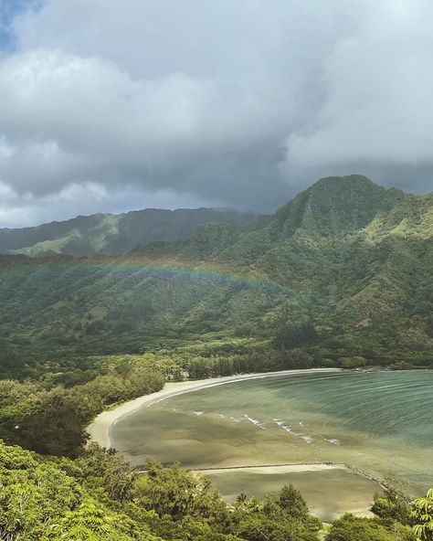 A small  but colorful rainbow seen from a viewpoint on the crouching lion hike in Oahu, Hawaii with the mountains and the ocean in the background Crouching Lion Hike Oahu, North Shore Hawaii Oahu, Summer In Hawaii Aesthetic, Oahu Hawaii Beaches, Honolulu Hawaii Aesthetic, Oahu Hawaii Aesthetic, Hiking Hawaii, Hawaii Hike, Oahu Restaurants