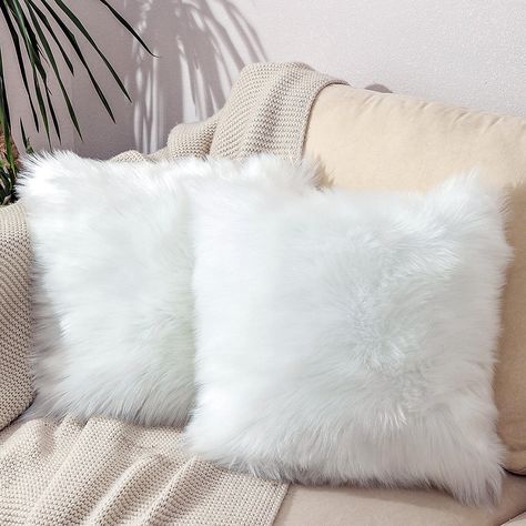 PRICES MAY VARY. 70% Polyester and 30% Acrylic 【Soft and fluffy】 Faux Sheepskin pillow case: the material is high density and super soft faux fur, and the back is crystal super soft fabric。 【Multi-Application】 It Can Be Used for Decorative Pillows of Bed Head, Sofa, Chair, Balcony and Car in Bedroom. Make Your Space More Beautiful. 【Environment Friendly Nontoxic】The Material is Made of Environment-Friendly and Non-Toxic Polyester and Acrylic Fiber. Whether The Elderly, Children or Pets Can Exper White Fuzzy Pillow, Fluffy Cushions Bedrooms, Fluffy White Pillows, Fluffy Pillows Aesthetic, White Fluffy Pillows, Winter Sleepover, White Fluffy Pillow, Room Decor Pillows, Sheepskin Pillow