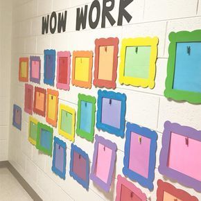 The wall is ready for a new batch or work this year! Primary Color Bulletin Board, Good Work Display Classroom, Family Wall In Preschool, Montessori Preschool Classroom Decor, Pre K Wall Ideas, Daycare Art Wall Ideas, Drawing Display Ideas, Art Wall Ideas Classroom, Art Wall Preschool Classroom