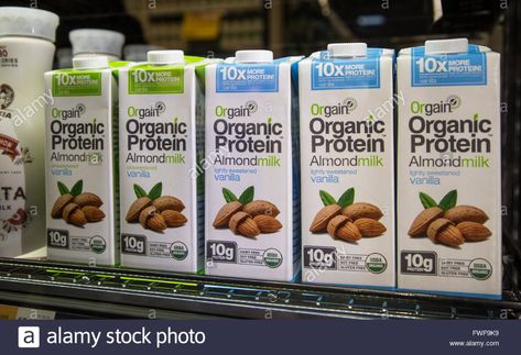 Download this stock image: cartons of Orgain organic almond milk on a shelf in a grocery store - FWF9K9 from Alamy's library of millions of high resolution stock photos, illustrations and vectors. Organic Almond Milk, Organic Protein, Clear Tape, Scotch Tape, Snack Bowls, Chewing Gum, A Shelf, Soy Free, Almond Milk