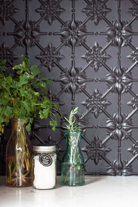 In the kitchen, a pressed tin splashback in matte black paint is a hero feature | Photography: Maree Homer #tininteriors Black And White Splashback, Pressed Tin Kitchen Backsplash, Pressed Metal Splashback Kitchens, Pressed Tin Splashback Kitchen, Black Tin Backsplash Kitchen, Black Splashback Kitchen, Kitchen Tile Splashback, Pressed Tin Splashback, Black Backsplash Kitchen