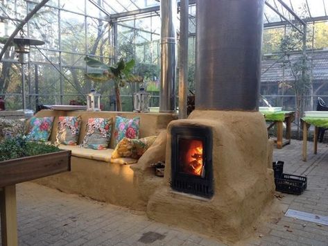 Rocket Stove Mass Heater, Wood Burner Stove, Underground Greenhouse, Mass Heater, Rocket Mass Heater, Casa Hobbit, Heating A Greenhouse, Earthship Home, Greenhouse Shed