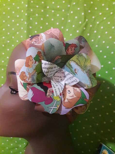 3 inch paper hair flower made out of a child Peter pan story book. Perfect for a child or an adult. @rollthedicepinup #rollthedicepinup Peter Pan Story Book, Peter Pan Story, Beer For Hair, Rockabilly Looks, Rockabilly Hair, Book Flowers, Tarnish Remover, Hair Flower, Makeup Stain