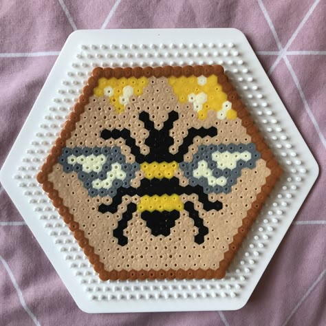 Honey bee in Hama beads | Melt beads patterns, Easy perler bead patterns, Christmas perler beads Bead Melting Crafts, Sunflower Melty Beads, Boho Perler Beads, Perler Bead Bee Pattern, Advanced Perler Bead Patterns, Iron Bead Patterns, Honeycomb Perler Bead Patterns, Square Perler Bead Patterns, Bee Perler Beads