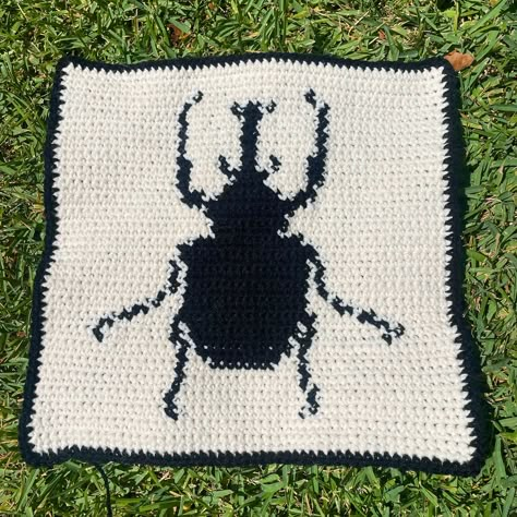 this pic was taken PRE block so don’t mind him looking a little funky:) but I wanted to post him anyways 🪲 🦏- - #crochet #crochetlove #crochetinspiration #inspo #yarn #tapestry #knit #grid #beetle #elephantbeetle #bug Crochet Beetle, Bug Tapestry Crochet, Bug Crochet, Creepy Crochet, Funky Crochet, Jumper Ideas, Yarn Tapestry, Colorwork Chart, New Project Ideas