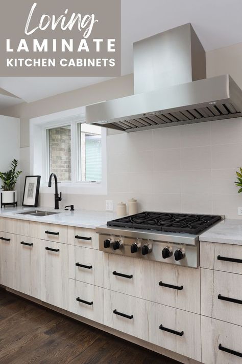 White modern kitchen with laminate cabinets Laminate Cabinets Modern, Melamine Cabinets Kitchen, Laminated Cabinets, White Laminate Cabinets, Laminate Cabinets Kitchen, Melamine Kitchen Cabinets, Wood Laminate Kitchen, Kitchen Expansion, Laminate Kitchen Cabinets