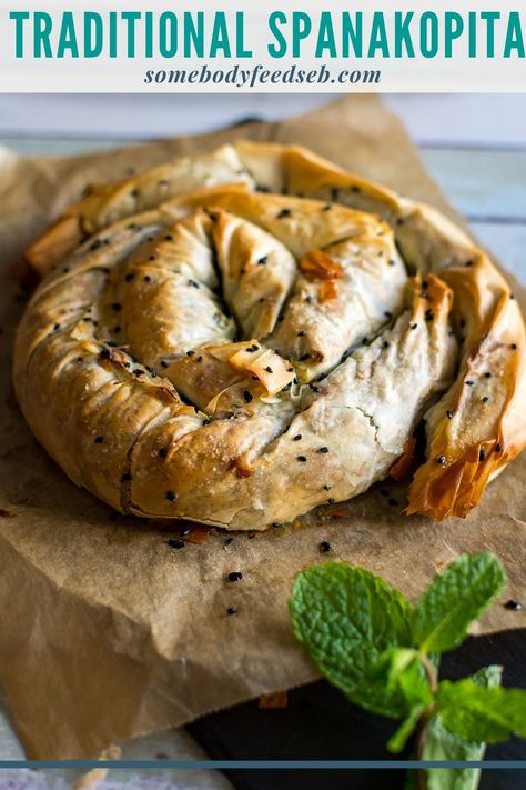 A lovely lighter vegetarian lunch or dinner that is packed full of spinach and feta! Creamy filling with the freshness of the mint and saltiness of feta won't disappoint, and the crispy golden brown filo pastry will add the needed crunch! A Traditional Spanakopita is definitely a winner on our lunch table! #spinachandfeta #easyspanakopita #filopastry #phyllopastry Turkish Pastries, Spinach Feta Pie, Zucchini Ricotta, Mini Cheesecakes Easy, Lunch Table, Spinach Feta, Filo Pastry, Freeze Greens, Savory Pastry