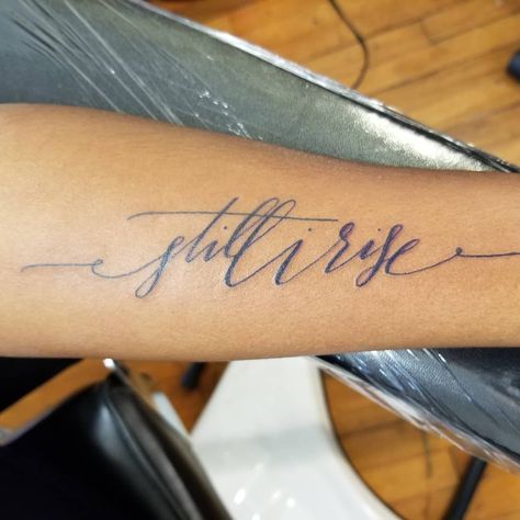 still i rise calligraphy tattoo #lettering #tattoo #stillirise #cursive #handwritten #tattoofont #ilikecalligraphy #underarm She Will Rise Tattoo, Still I Rise Tattoo Fonts, I Rise Tattoo, Still I Rise Tattoo, Rise Tattoo, Be Still Tattoo, Calligraphy Tattoo Fonts, Maya Angelo, Wörter Tattoos