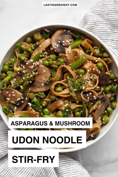 With udon noodles, mushrooms and peas, this asparagus stir-fry goes big on vegetables. Fresh ginger and garlic, along with scallions, give it lots of flavor. This is one of those recipes that’s great for a quick weeknight dinner. And it makes leftovers that you will look forward to eating on another day. Asparagus Noodles Recipes, Easy Udon, Asian Asparagus, Seasonal Dinner Recipes, Mushroom Asparagus, Asparagus Mushroom, Asparagus Stir Fry, Udon Noodle, Asparagus And Mushrooms