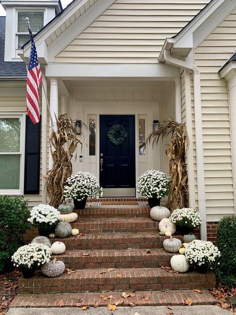 This is my favorite fall porch to date. White mums, neutral pumpkins and corn stalks. ❕ Neutral Pumpkins, Mums Wedding, White Mums, Fall Mums, Corn Stalks, Front Porch Decorating, Fall Porch, Small Wedding, Porch Decorating