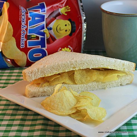 A plate with a sandwich of potato chips beside a chip package and a mug Anthony Goldstein, Crisp Sandwich, Irish Snacks, Colin Creevey, Cheese And Onion Crisps, Irish Foods, Ireland Food, Irish Food, Potato Crisps