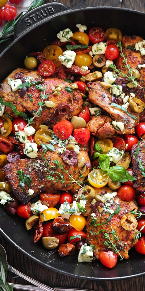 Greek Chicken with Cherry Tomatoes, Olives, Sun-Dried Tomatoes, Lemon Juice, and Feta Cheese - in a cast iron pan. Sun Dried Tomato Feta Chicken, Chicken Olives Tomatoes, Chicken Olives Tomatoes Recipe, Chicken Olives Recipe, Olive Chicken Recipe, Chicken And Olives Recipe, Greek Chicken With Lemon And Feta, Chicken Feta Tomato Recipe, Recipes With Cherry Tomatoes