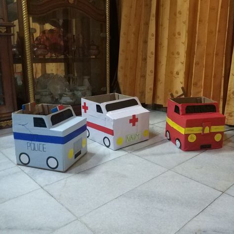 Diy Ambulance Costume, Ambulance Costume Diy, Diy Ambulance Cardboard, Fire Truck Police Car Ambulance Party, Cardboard Box Ambulance, Ambulance Birthday Party Ideas, Cardboard Firetruck, Ambulance Costume, Police Car Craft