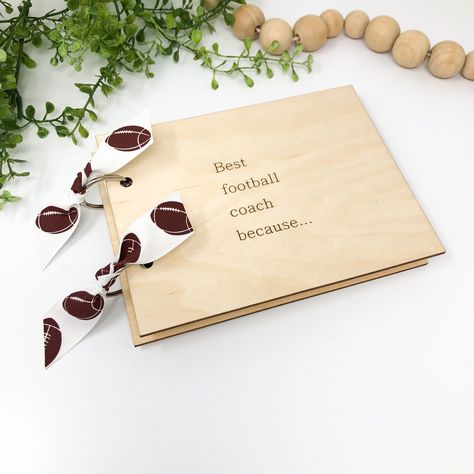 "This is for the MEDIUM sized notebook.  This beautifully handcrafted wooden \"Best football coach because...\" notebook is the perfect gift for a great coach. A wonderful way for a team or player to let their coach know how much they appreciate them. 📔 INCLUDED: 1 - \"Best football coach because...\" Notebook 📔 SIZE: Front and back wooden cover - 6.5\" x 5\" Pages - 6\" x 4.5\" 📔 PAGES: Includes 40 sheets  📔 BINDING Our notebooks are bound with 1\" nickel finished loose leaf rings.  Rings can be opened to add paper. 📔 PROCESSING TIME Your notebook will ship within 1-3 business days after purchase. 📔 STANDARD SHIPPING TIME 2-6 business days via USPS First Class Mail 📔 PRIORITY SHIPPING TIME 1-4 business days via USPS Priority Shipping Click here to see all of our notebook styles htt Gift For Coach, Football Coach Gifts, Leaf Rings, Coach Gift, Football Coach, Rings Rings, Coach Gifts, Leaf Ring, Loose Leaf