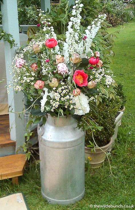 A classic Wilde Bunch rustic milk churn wedding design at Maunsel House, Somerset. Our barn HQ is on a dairy farm just outside Bristol so our churns are 100% the genuine article....no naff half sized replicas in our designs!! Dairy Wedding, Spring Farm Wedding, Dairy Farm Wedding, Summer Ceremony, Milk Churn, Working Farm, Barn Dance, Purple Wedding Flowers, Summer Wedding Outdoor