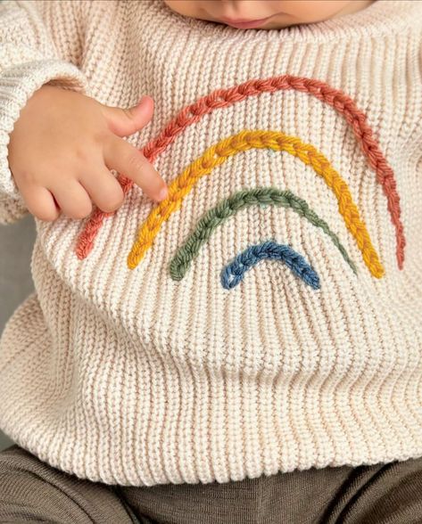 Enhance your little one’s winter wardrobe with our adorable hand-embroidered rainbow sweater!🌟 With sizes available from 0-3 months to 2 years, our keepsake sweaters are not only cosy and comfortable but also personalised with a hand-embroidered design, making them the ultimate statement piece for any occasion, capturing the essence of your little one’s personality. We can’t wait to help you celebrate every precious moment in style. Because when it comes to your baby, only the best will do... Hand Embroidered Baby Clothes, Embroidered Baby Clothes, Embroidered Rainbow, Baby Keepsakes, Rainbow Sweater, Baby Embroidery, Baby Cardigan, Baby Sweaters, Embroidered Design