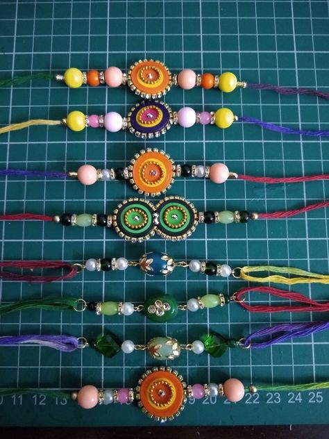 These are hand made rakhis with Quilling technique. Quilling Rakhi Handmade, Quilling Rakhi, Handmade Rakhi, Rakhi Design, Quilling Techniques, Hand Made, Beaded Bracelets, Anime, Quick Saves