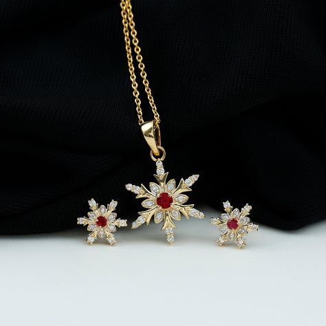 Gold snowflake necklace