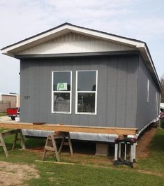 Modern Single Wide Mobile Homes, Trailer Colors Exterior, Decorating Mobile Homes Single Wide, Mobile Home Lighting Ideas, Singlewide Trailer Remodel, Single Wide Kitchen Ideas, Mobile Home Cottage, Mobile Home Exterior Makeover, Single Wide Living Room Ideas