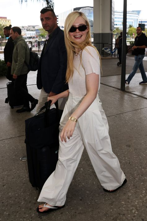 Elle Fanning Cannes 2023, Chic Airport Outfit, Celebrity Airport Outfit, Airport Outfits, Pucci Print, Nike Air Max Excee, Celebrity Gowns, Airport Look, Wearing All Black