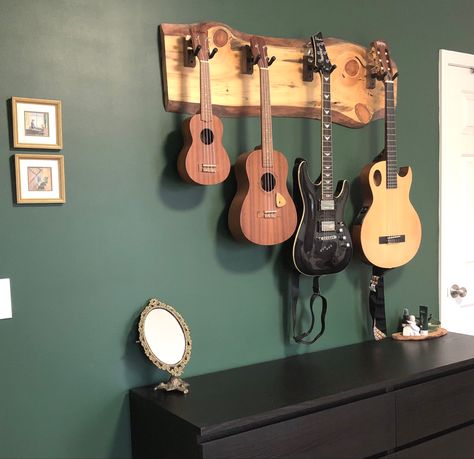 Raw wood guitar hanger live edge wood creative Guitar Hanging Ideas, Live Edge Wall, Country Guitar, Guitar Wall Hanger, Epoxy Ideas, Wood Guitar, Guitar Hanger, Guitar Wall, Live Edge Wood