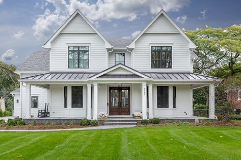 Beautiful white modern farmhouse with black windows and metal roof and front porch Black Metal Roof, Metal Roof Houses, Mobile Home Exteriors, White Modern Farmhouse, Home Exteriors, Farmhouse Patio, Porch Addition, Roof Styles, House With Porch