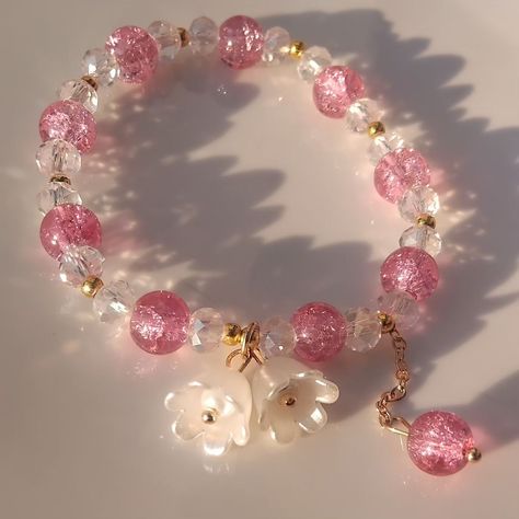 Blossom Glow Bracelet🩷🤍 • A touch of elegance in every bead – embrace the charm of pink and gold with our beautiful bracelet✨️ • DM TO PLACE IN YOUR ORDERS�💟 • If viewing follows:@marbles_treasuree for more styles & accessories!🌸beaded bracelets, necklaces,rings, and anklets.🫶🫶 IG:@marbles_treasuree📸 Diy Beaded Charm Bracelet, Marble Bracelet Ideas, Pink Beaded Bracelets Diy, Stone Bead Bracelets Ideas, Diy Glass Bead Bracelets, Elegant Beaded Bracelets, Pink Beads Bracelets, Bead Anklet Ideas, Bracelet Ideas Glass Beads