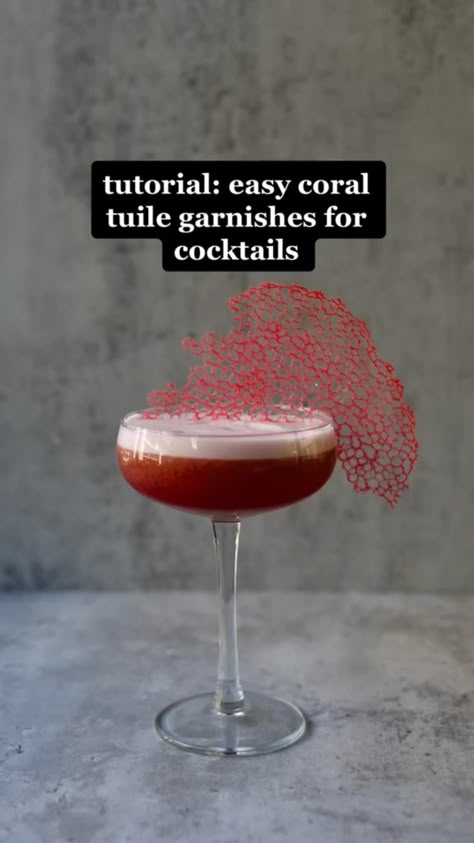 - Coral Tuile Garnish Tutorial - 

Made these for the first time the other day and I want to put them on everything now 😅 They are so beautiful, easy to make, and you can play around with the color and shape to fit exactly what you’re looking for.

To make:
 • - combine 1/4 cup water, 1/4 cup vegetable oil, and 1 unleveled tablespoon of all purpose flour 
 • - Mix very well
 • - If you want to make multiple colors, divide mixture and add food coloring of your choice
 • - Heat a quality nonstick pan to medium high heat (I’m using @ourplace pan) 
 • - Add a tablespoon of mixture and let it boil
 • - Once it starts to get crispy and the edges curl up, use a spatula to remove the tuile from the pan
 • - Place tuile on a plate with a paper towel to soak up excess oil. Let cool completely Amazing Cocktail Garnish, Crispy Garnish Ideas, Diy Cocktail Garnish, Fall Drink Garnish, Easy Cocktail Garnish Ideas, Fancy Cocktail Garnish, Cocktail Garnishes Ideas, Fancy Garnish Food, Tuile Plating