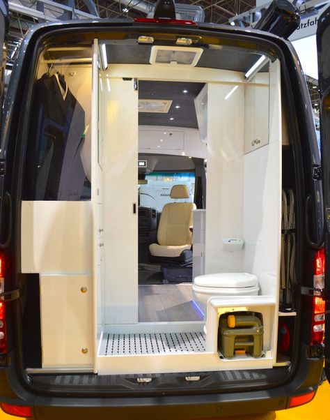 The Sprinter's rear houses a bathroom with integrated wardrobe closet Stealth Camper Van, Luxury Campers, Camper Bathroom, Mercedes Sprinter Camper, Mercedes Van, Diy Campervan, Camping Diy, Van Storage, Kombi Home