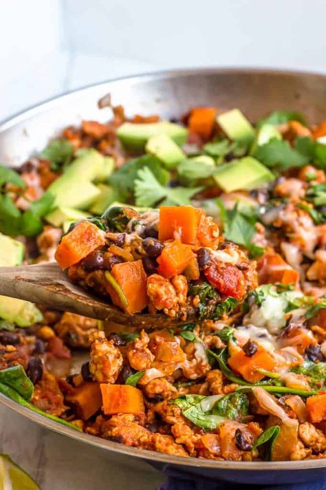 This Taco Ground Turkey Sweet Potato Skillet is packed with veggies, protein, and flavor! Made in one skillet, gluten free, and done in about 30 minutes, it is the perfect hearty dinner to make on a busy weeknight. Ground Turkey And Sweet Potato, Ground Turkey Sweet Potato Skillet, Turkey Sweet Potato Skillet, Ground Turkey Sweet Potato, Turkey And Sweet Potato, One Pan Dinner Recipes, Turkey Sweet Potato, Taco Skillet, Potato Skillet