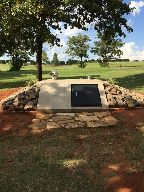 Storm cellar landscaping Storm Cellar Interior, Tornado Shelter Decorations, Cellar Ideas Underground, Storm Cellar Landscaping, In Ground Storm Shelter, Basement Storm Shelter Ideas, Storm Shelter Ideas Decor, Storm Cellar Ideas, Storm Shelter Landscaping