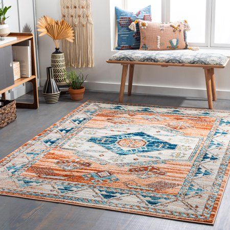 "The Tevazu Traditional Area Rug Collection features a central diamond motif and coordinating colors including blues, ivory, rust and tan. This collection stands its own remarkably against heavy foot traffic, spills, kids and pets, so you can place it in any room. That's because it's made of polypropylene fibers, which is one of the most durable materials. Rugs in this collection are made of medium pile and feel soft underfoot, making them perfect for living spaces and bedrooms. Machine made in Blue And Orange Rug, Cottage Rug, Light Blue Area Rug, Orange Rug, Cream Area Rug, Area Rug Collections, Orange Area Rug, Traditional Area Rugs, Unique Spaces