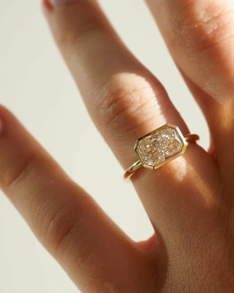 East-West Engagement Rings East West Engagement Ring, Elongated Radiant, Radiant Diamond Engagement Rings, Radiant Cut Diamond Ring, Gold House, Radiant Moissanite, Lab Created Diamond Rings Engagement, Bezel Set Engagement Ring, Radiant Cut Engagement Rings