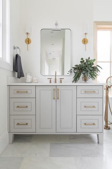 Brass Hardware Bathroom, Curved Vanity, Bathroom Cabinet Colors, Light Grey Bathrooms, Grey Bathroom Cabinets, Light Gray Cabinets, Grey Bathroom Vanity, Brass Sconces, Gray Vanity