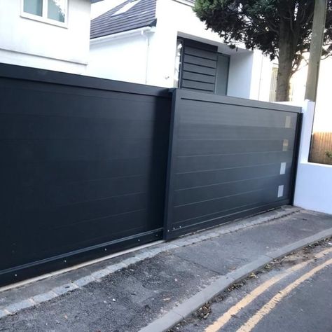 Due to lack of space on this clients driveway we made the sliding gate in two sections creating a telescopic system where one part of the gate slides past the other to require half the typical space. Being fully aluminium it's ideal for it's coastal setting. The automation system gives ease of access through timed entry as well as security when the buttons are disabled. Sliding Gate Design Modern Entrance, Telescopic Sliding Gate, Aluminium Gates, Sliding Gate, Driveway Gate, Driveway, Backyard Landscaping, Fence, Gate