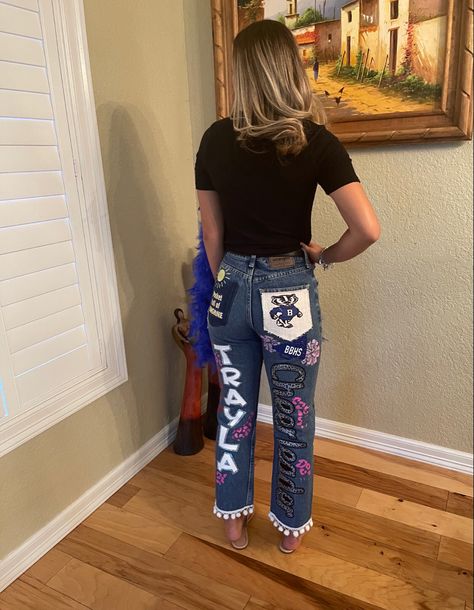 Homecoming Spirit Pants made with cricut , vinyl & sublimation patches Hoco Painted Jeans, Homecoming Jeans Painted, Painted Jeans Ideas, High School Spirit Wear, Homecoming Jeans Ideas, School Spirit Outfit, Senior Painted Jeans, Big Homecoming Mums, Homecoming Mums Senior