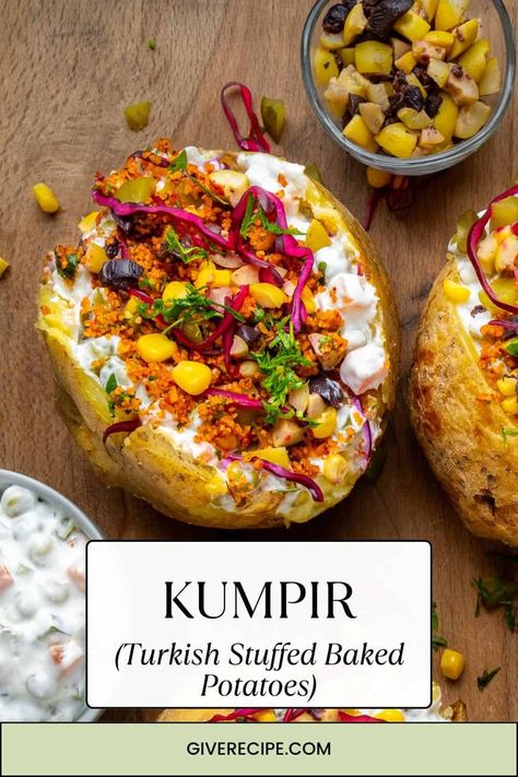 Enjoy Kumpir, a beloved Turkish street food! This large baked potato is mixed with butter and cheese, then topped with olives, corn, pickles, and more. Don't miss it in Istanbul's Ortaköy district! Turkish Baked Potato, Turkish Potatoes Recipes, Turkish Vegetarian Recipes, Kumpir Recipe, Turkish Street Food, Turkish Snacks, Turkish Dishes, Baked Potato With Cheese, Best Baked Potato