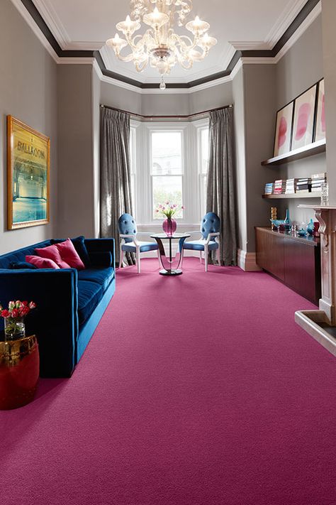 Bold, opulent colour conveys luxury when this deep fuchsia cut pile carpet is combined with rich teal velvet upholstery and splashes of gold. A truly indulgent style.  Credits – Carpet: Godfrey Hirst Carpets; Sofa: Maison Est; Side table: Asian Tide; Ballroom art & chairs: Nomad; Blue vessels: Amalfi; Pink cushions: Great Dane Pink Carpet Bedroom, Pink Carpet Living Room, Ballroom Art, Grey Carpet Bedroom, Cascade Falls, Orange Carpet, Teal Velvet, Buying Carpet, Pink Carpet