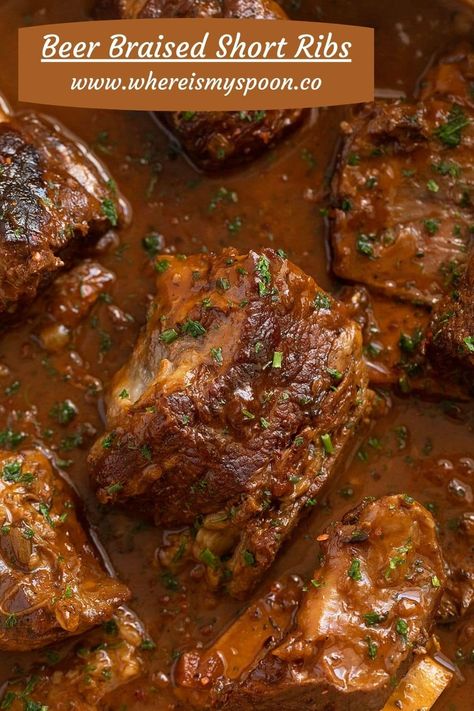 These melt-in-your-mouth, flavorful beer-braised short ribs with Guinness are best served on a bed of creamy mashed potatoes. This is comfort food at its best! #whereismyspoon #beershortribs #shortribsrecipe #braisedshortribs #cookshortribs #beefshortribs #guinnessshortribs #guinnessribs #guinnessrecipe #stpatricksdayrecipes #stpatricksdayfood Short Ribs Dutch Oven, Cooking Beef Ribs, Beef In Beer, Short Ribs In Oven, Short Rib Recipes Oven, Braised Beef Short Ribs Recipe, Ribs Recipe Oven, Beer Braised Short Ribs, Short Rib Stew