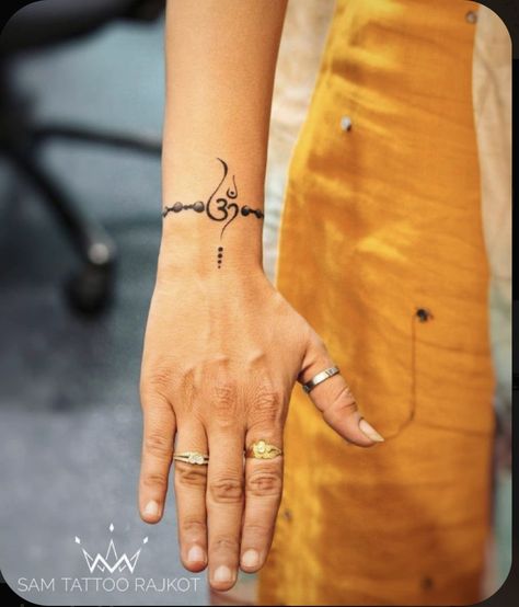 Om Tattoo Designs For Women, Om Tatoos Men, Small Om Tattoo For Women, Spiritual Wrist Tattoos For Women, Small Shiva Tattoos For Men, Shiv Related Tattoos, Om Tatoos Design For Women, Om Tattoos For Women, Om Mehndi Designs