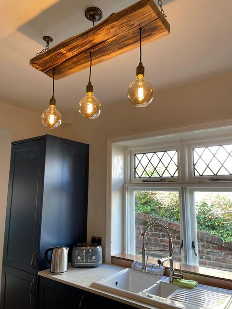 Log House Lighting, Hanging Lights Over Kitchen Island, Dining Room Lighting Over Table, Beam Chandelier, Beam Lighting, Cluster Pendant Light, Lights Over Kitchen Island, Wooden Beam, Wooden Beams Ceiling