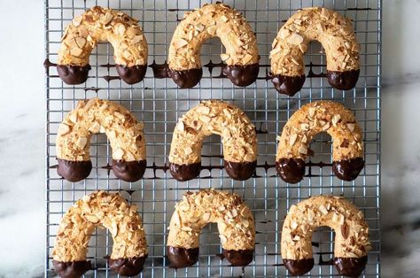 Mandelhörnchen (Almond Horns) | King Arthur Baking: These chewy almond cookies are topped with slices of toasted almonds and dipped in chocolate, making the ultimate treat. Almond Horn Cookies, Almond Horns, Horn Cookies, Chewy Almond Cookies, Cloud Cookies, Icebox Cookies, King Arthur Baking, Dipped In Chocolate, Chocolate Making