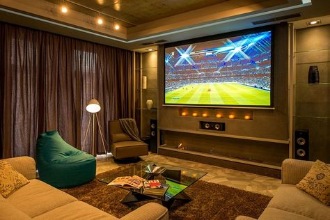 Projector, screen and speakers make up the smart entertainment unit - Decoist Tv Unit With Projector Screen, Gamer Room Diy, Small Tv Room, Home Cinema Projector, Best Living Room Design, Home Cinema Room, Home Theater Decor, Home Theater Setup, Home Theater Rooms