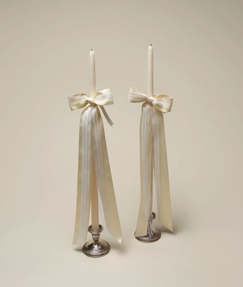 Dramatic and towering, this hand-dipped taper candle features a layered satin and lace bow.   24 inches tall.  New Color: Ivory & Cream (coming soon) Tafel Decor, Wedding Mood Board, Lace Bows, Wedding Mood, White Candles, 가을 패션, Rehearsal Dinner, Wedding Bells, Engagement Party