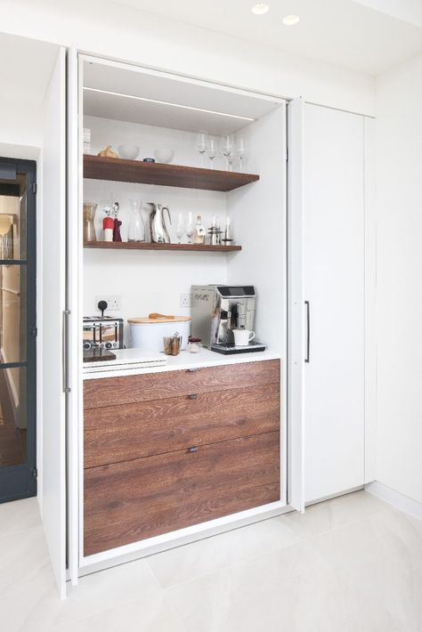 In this Kitchens International Poggenpohl installation in Edinburgh, the pocket door conceals the coffee station. | #kitchendecor #kitchenisland #kitchenislandideas #storageideas #stoarge #kitchenstorage #breakfastcupboard #breakfastbar #pantry #larder #larderideas #cupboardideas #pocketdoor #pocketdoors #coffeestation #kbbmag What To Think About, Kitchen Renovation Inspiration, Kitchen Larder, Property Renovation, Larder Cupboard, Coffee Bars In Kitchen, Extension Ideas, Pocket Door, Kitchen Cabinet Doors