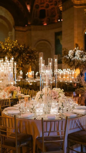 Birch Event Design on Instagram: "Heart of gold 🧡 Design, Production, Florals @BirchEventDesign Planning @gourmetadvisoryservices Venue @cipriani Photography @fredmarcusstudio Entertainment @elementmusicnyc #luxurywedding #luxuryweddingplanner #luxuryweddingdecor #weddingdecor #weddingdesign #weddingdesigner #floraldesign #floraldesigner #weddingflowers #weddingplanning #weddinginspo #weddingflorals #glamwedding #weddingideas #enchantedwedding#weddinginspiration #weddingreceptiondecor #w Birch Event Design, Ballroom Wedding Reception Decoration, Tall Candle Wedding Centerpieces, Tall Candle Centerpieces, Tall Candle Centerpieces Wedding, Wedding Table Centerpieces Candles, Tall Candles Wedding, Candle Lit Wedding Reception Romantic, Tall Candle Centerpiece