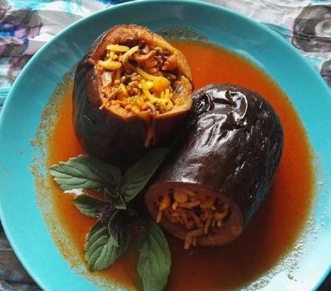 Make Dolmeh Bademjan, one of the most popular and delicious Iranian dishes made with eggplant, minced meat, and rice. Bademjan Recipe, Dill Rice, Herbed Rice, Iranian Dishes, Potato Frittata, Stuffed Eggplant, Saffron Rice, Welcome To Paradise, Pomegranate Molasses