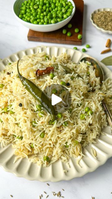 Zahra on Instagram: "A warm plate of matar pulao, cool tangy yogurt, and spicy achar.  A nostalgic and comforting meal ♥️

Find the full recipe on https://www.foodnetwork.ca/recipe/matar-pulao-green-pea-rice/

#pulao #pulaorecipe #inseasonnow #veganrecipeshare #easydinnerideas #ricerecipes #indianfoodrecipes #comfortfoodrecipes" Rice Pulao Recipes, Kashmiri Pulao Recipe, Green Peas Pulao Recipe, Peas Pulao Recipe, Peas Pulao, Rice Pulao, Pearl Barley, Pulao Recipe, Rice And Peas